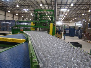 Empty bottles headed to the filling line